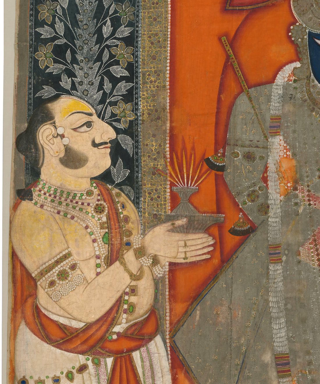 Detail of a temple priest holding a lamp, from a Kota painting