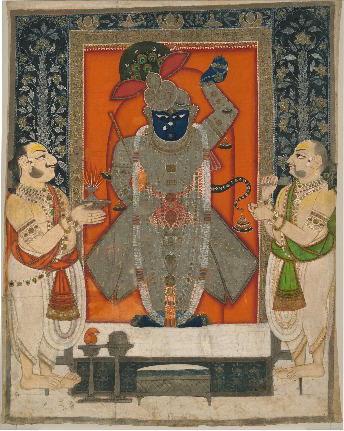 Kota school painting of two priests worshipping Krishna as Shrinathji on the festival of Annakuta
